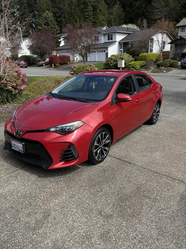 Red Toyota Corolla after a full detail